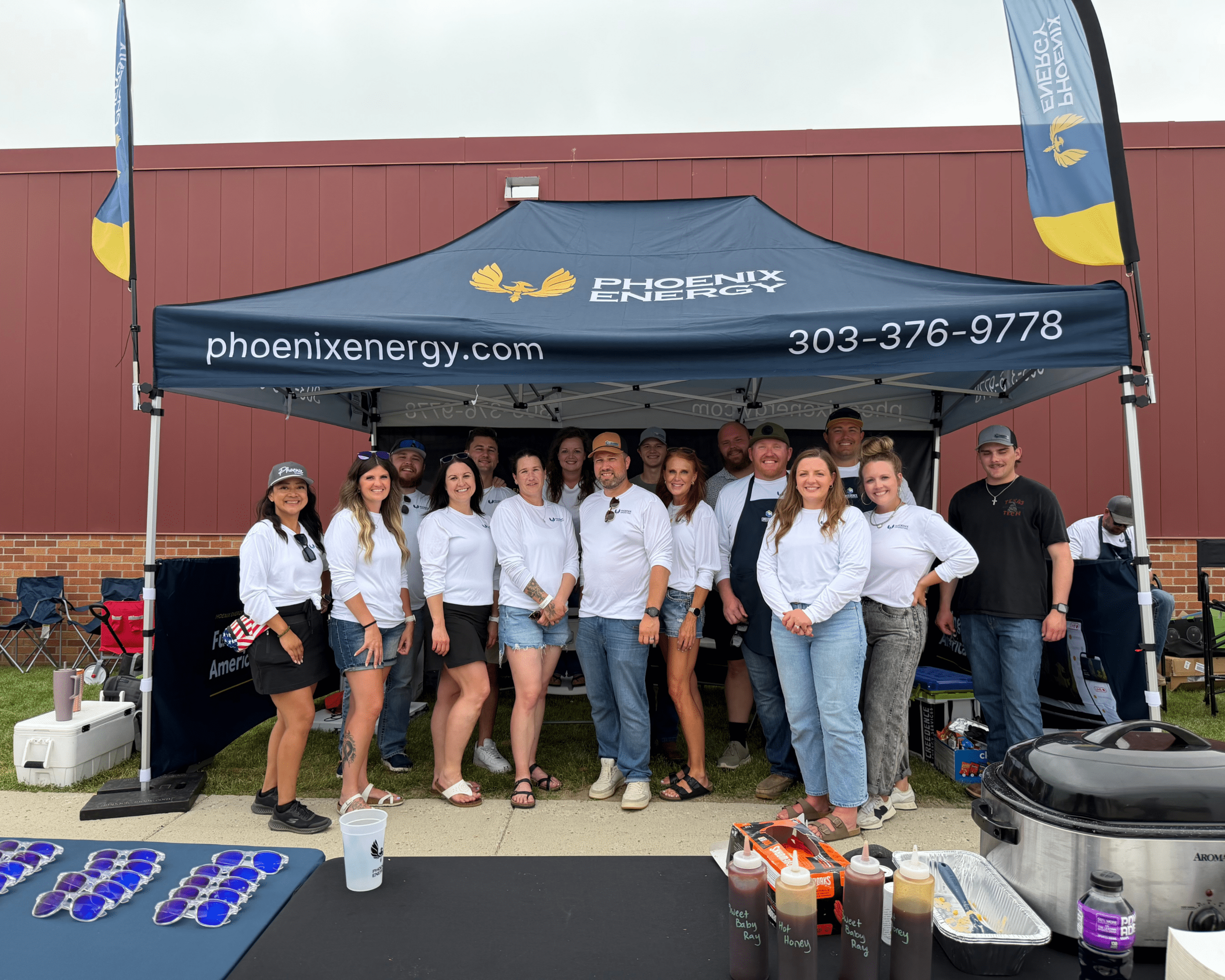 Phoenix Energy and Creedence Energy Services team serving barbecue at the 2026 Bakken Rocks CookFest in Powers Lake, North Dakota